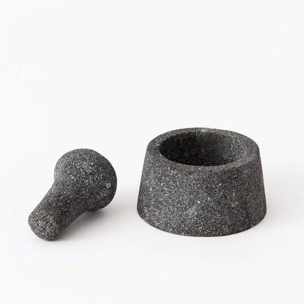 Pilon et mortier en pierre